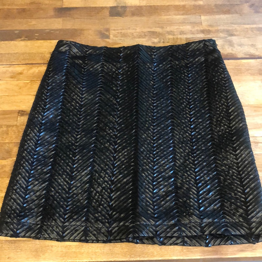Black skirt with decorative design stitched in black